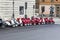 Parked scooters in front of a rental shop