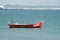 Parked single fishing boat on Thangasseri beach