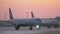 Parked and taxiing planes at Sheremetyevo Airport in Moscow. Evening winter view