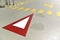 Parking for cars with a red and white Yield sign, crossing sign and pedestrian guidance.
