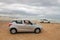 Parking cars and visitors on Sonwabi Beach, at the beautiful and wide False Bay near Cape Town. South Africa.