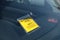 Parking fine penalty notice on windscreen