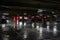 Parking garage interior with a few parked cars. Underground parking garage in Bucharest, Romania, 2021