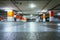 Parking garage in the underground. Asphalt and empty parking lots