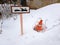 Parking at the house - road chip and a tow truck sign