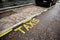 Parking lane for taxi cars and cabs in Brittish and Scottish cities with a yellow text on a road