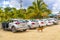 Parking lot with cars dogs to Muyil Mayan ruins Mexico