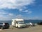 Parking motorhome near to the Black Sea in the parking lot at the entrance of Nessebar resort, Bulgaria