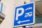 Parking p arrow sign blue camper car motorhome parked in city street