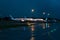 Parking of passenger aircraft at the airport. Evening rain