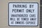 Parking By Permit Only Unauthorized Cars Will Be Towed Away At Owners Expense Sign