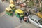 Parking rickshaws and people on the Indian shopping street aerial view