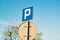 Parking sign showing free places. Traffic parking sign with clean sky and light ray. Cars became biggest problem for