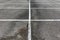 Parking spaces lines on asphalt oil stained