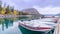 Parking speed boats at a small deck of Lake Minnewanka during Autumn, Banff national park