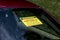 Parking warning ticket on windshield