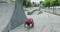 Parkour athlete doing extreme front flips off ledge on urban skateboard track