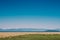 Parksville, Canada - June 27, 2021: Beachgoers at Rathtrevor Beach on sunny day.