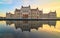 Parliament building in Budapest on a sunset with reflection