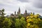 Parliament Hill, Ottawa, Rideau canal. Cloudy sky in Autumn city.