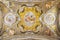 PARMA, ITALY - APRIL 17, 2018: The fresco of angels with the symbols of the martyrdom on the wault of church Chiesa di Santa Lucia