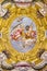 PARMA, ITALY - APRIL 17, 2018: The fresco of angels with the symbols of the martyrdom on the wault of church Chiesa di Santa Lucia