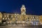 PARMA, ITALY - APRIL 18, 2018: The palace Palazzo del Governatore - Governor`s palace at Piazza Garibaldi at dusk