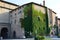 Parma, Italy - October 6, 2016 - Palace, Palazzo della Pilotta with climbing green plants , Parma, Italy