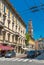 Parma, Italy: One of the street in the center of Parma. Cars parked on the street with traditional Italian architecture