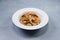 Parmesan risotto topped with roasted shrimp.