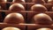 Parmesan wheels cheese forms seasoning at a Parmigiano Reggiano factory