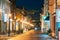 Parnu, Estonia. Night View Of Famous Ruutli Street With Old Buildings, Restaurants, Cafe, Hotels And Shops In Festive