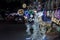 Parols and other christmas decor for sale at a stand at nighttime. A Filipino ornamental lantern displayed during the xmas season