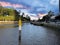 Parramatta River walkway lined with trees Ferry Wharf and High rise residential appartments on Parramatta River