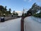 Parramatta River walkway lined with trees Ferry Wharf and High rise residential appartments on Parramatta River