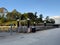 Parramatta River walkway lined with trees Ferry Wharf and High rise residential appartments on Parramatta River