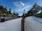 Parramatta River walkway lined with trees Ferry Wharf and High rise residential appartments on Parramatta River