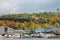 PARRY SOUND, ONTARIO, CANADA - SEPT 25, 2006:  Boats and Train with Autumn Foliage at the world`s deepest natural freshwater port