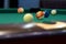 Part of the American pool table with balls.