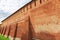 Part of the brick wall of the ancient Kremlin. Kolomna, Russia