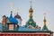 Part of the christianity church with golden crosses on golden domes