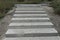 Part of a concrete staircase with gray steps