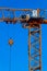 Part construction crane with blue sky background