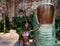 Part of a courtyard in Mexico with sculptures of a thumb and a man