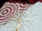 Part of the dandelion seed with water droplets on the background with circles