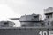 Part of the deck of a warship. communication devices and deck guns.