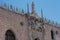 Part of the facade of Doge`s Palace Palazzo Ducale in Venice during the day show the detailed gothic style architecture