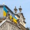 Part of the facade of St. George`s Church with flags in Lviv, Ukraine