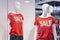 Part of a female mannequin dressed in casual clothes with the text sale in a shopping department store for shopping, fashion