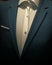 Part of formal male garment, close up. Classic jacket with white shirt made out of high quality textile, luxury clothes